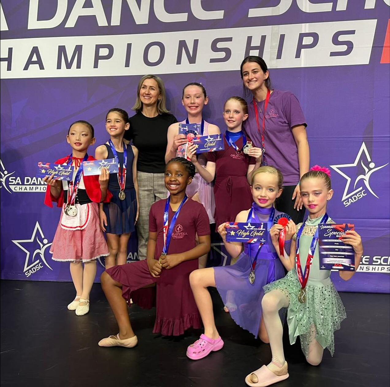 Orlovska Dance Academy students and teachers celebrating their medal haul at the SA Dance School Championships.